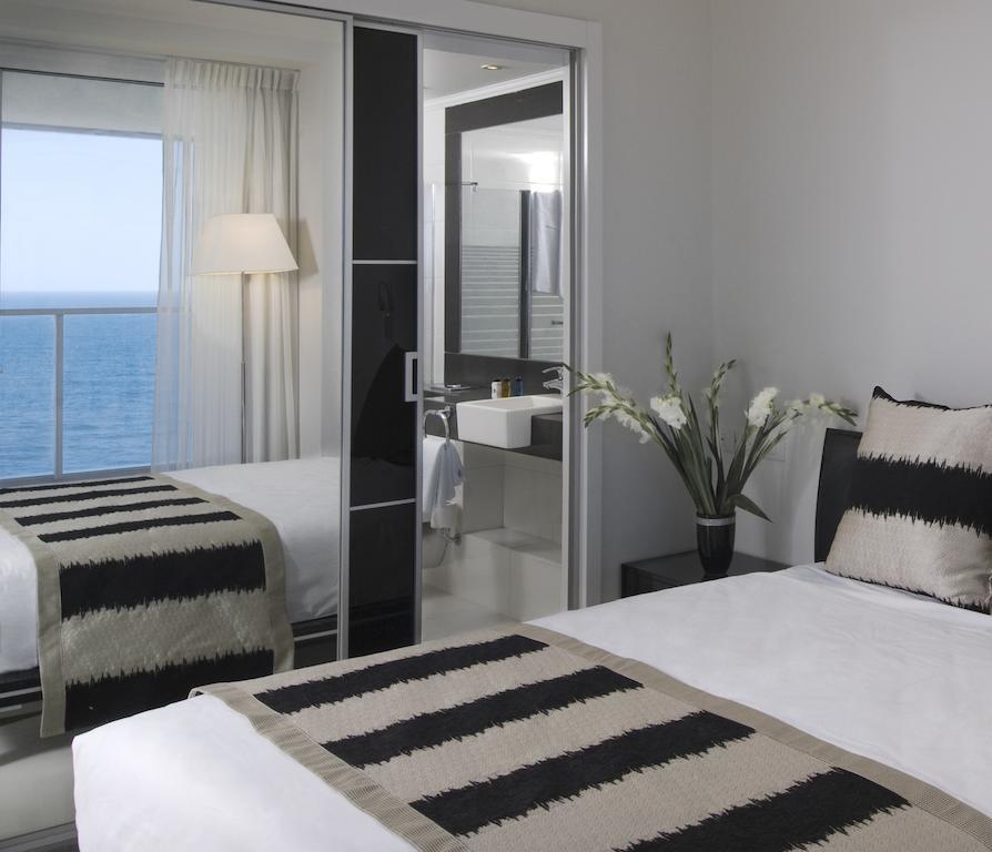 Island Luxurious Suites Hotel And Spa Netánja Szoba fotó
